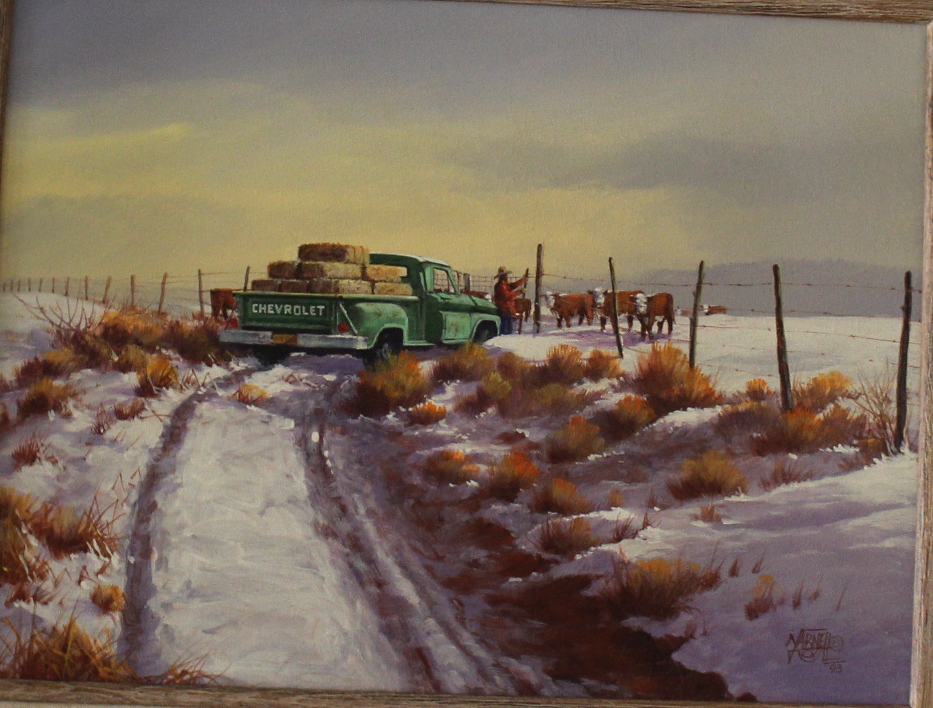 Original western cowboy painting snowy landscape with a truck, and a cowboy feeding the cows